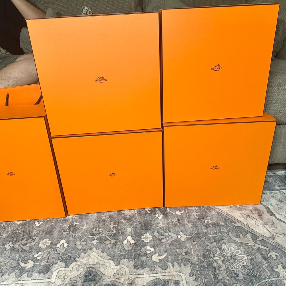 Vibrant Orange Cube Storage 45$ each with ribbon